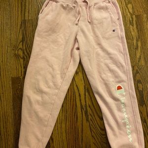 Girls light pink champion sweat pants.